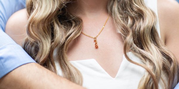 revelaire personalized customized name changing illusion jewelry necklace pendant around neck in 18 karat gold plated brass on woman with husband boyfriend gift idea